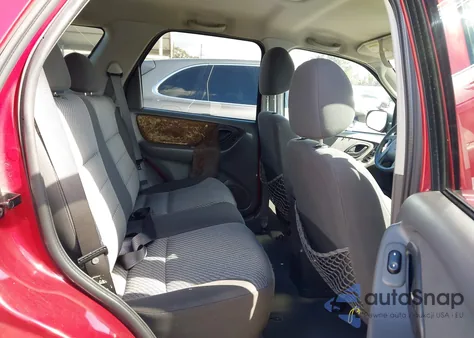 2003 Ford Escape Xlt z USA, uszkodzony, nr VIN 1FMYU93123KB74415